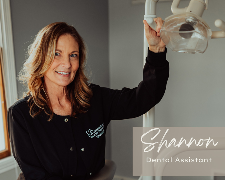 A woman is holding a glass jar, standing in front of a dental chair and equipment, with the text  Shannon Dental Assistant  visible.