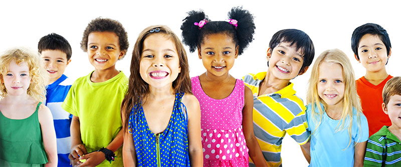 A group of diverse children posing for a photo with smiles on their faces.